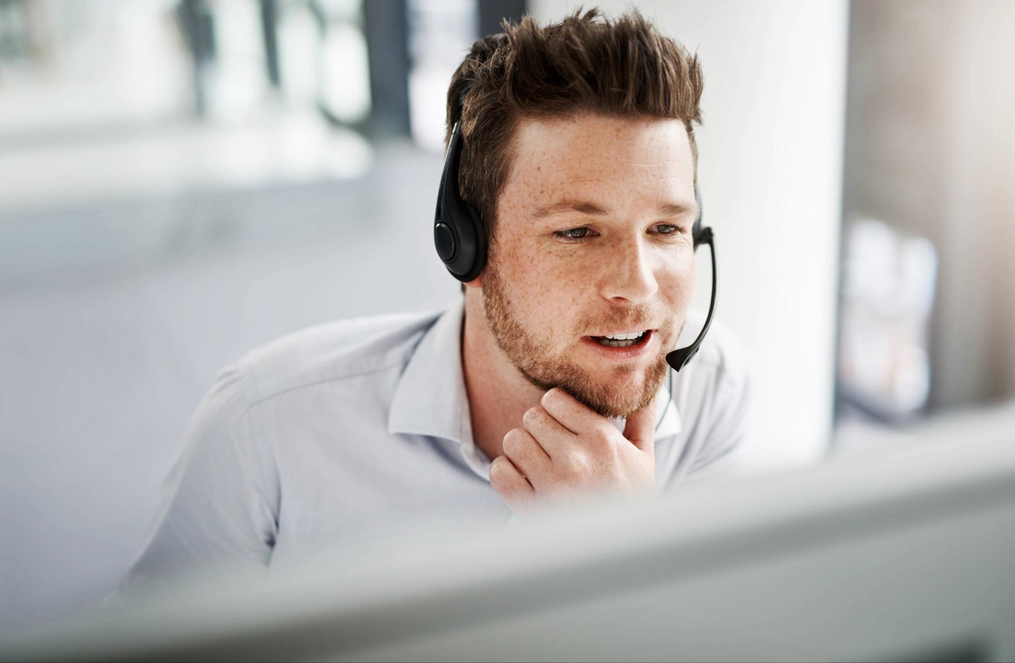 An image of a man in a call center
